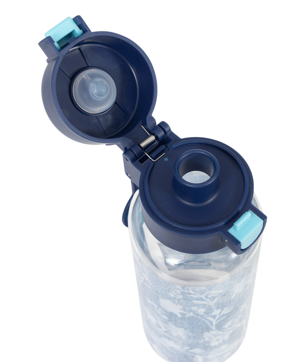 Spencil Denim Daze Big Water Bottle 650ml, close-up from above with the lid open showing the spout and seal, pale denim-blue print with white botanical sprigs, navy lid with light blue clip