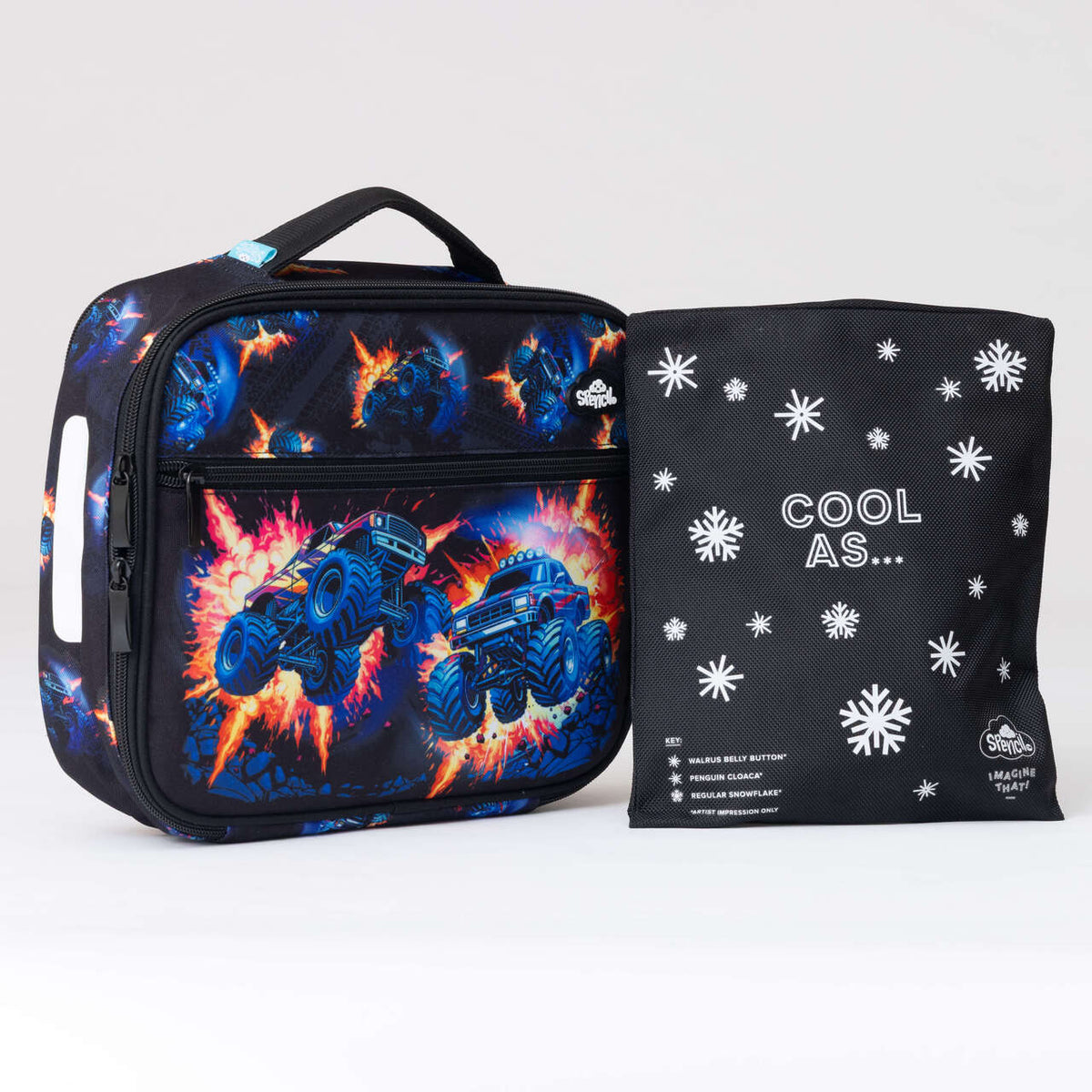Spencil Monster Blaze Big Cooler Lunch Bag photographed beside the Big Chill Pack in its black snowflake cover, showing the black bag with blue monster trucks bursting through fiery orange explosions