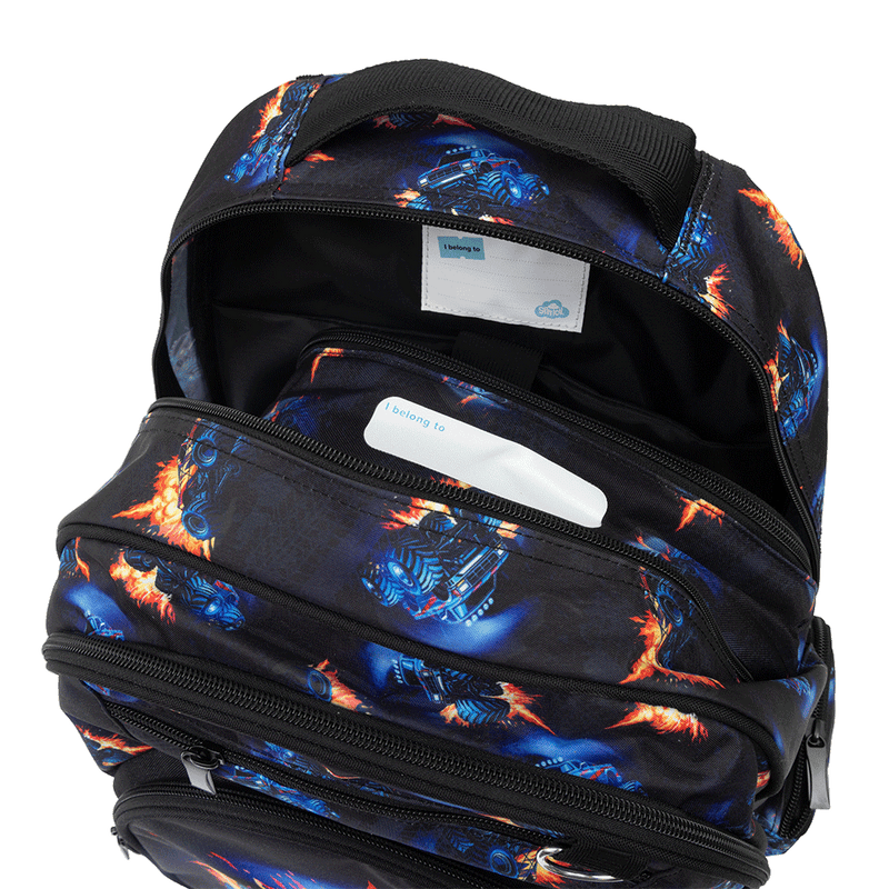 Spencil Monster Blaze Big Kids Backpack, open main compartment showing the padded device sleeve, blue monster truck bursting through orange flames on black