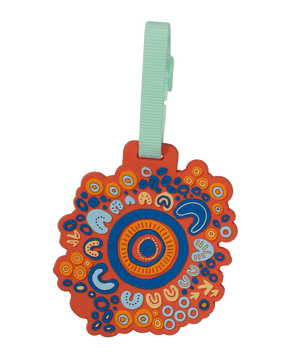 Spencil Ngootypoorteen Bag Tag, front view showing the orange scalloped circle pattern in blue, cream and tan