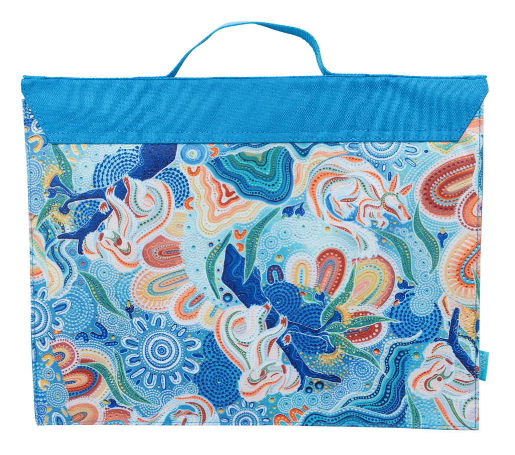 Back of the Spencil Wani-Wani Watina library bag with the blue and coral artwork print running across the panel beneath the plain fold-over flap and top handle