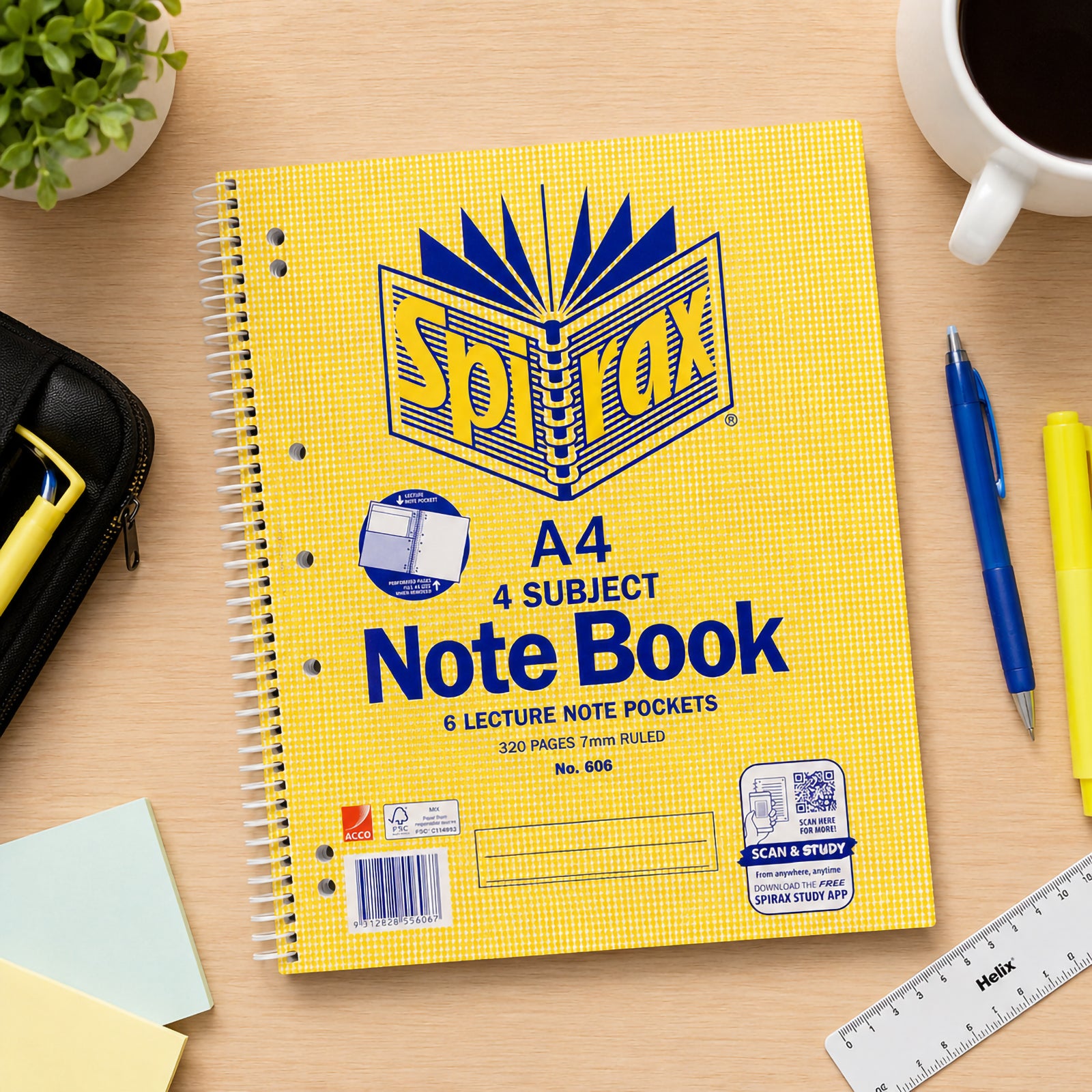 Top view of the Spirax 606 A4 four subject notebook resting on a tidy workspace surrounded by stationery, coffee, ruler, highlighters and study supplies, highlighting the durable cover, side spiral binding and lecture note pocket feature.