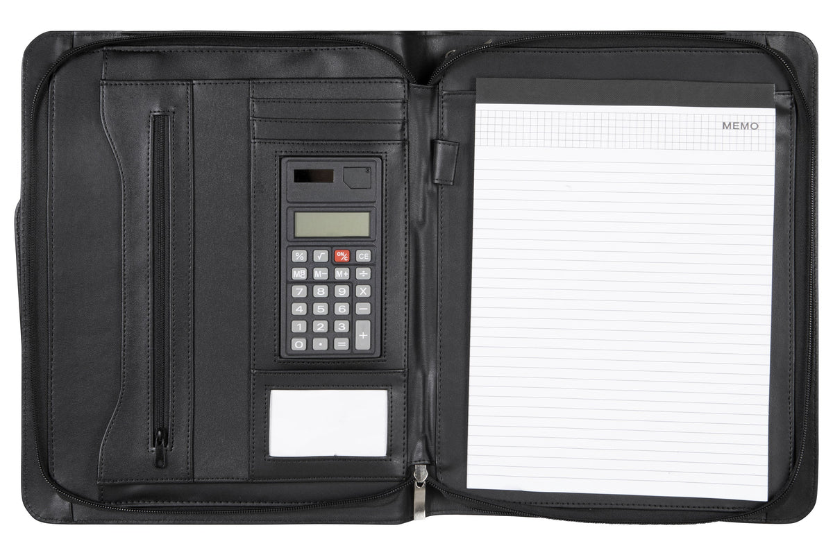 Spirax executive compendium opened flat, with a zip pocket, calculator and card window on the left and a ruled A4 memo pad on the right