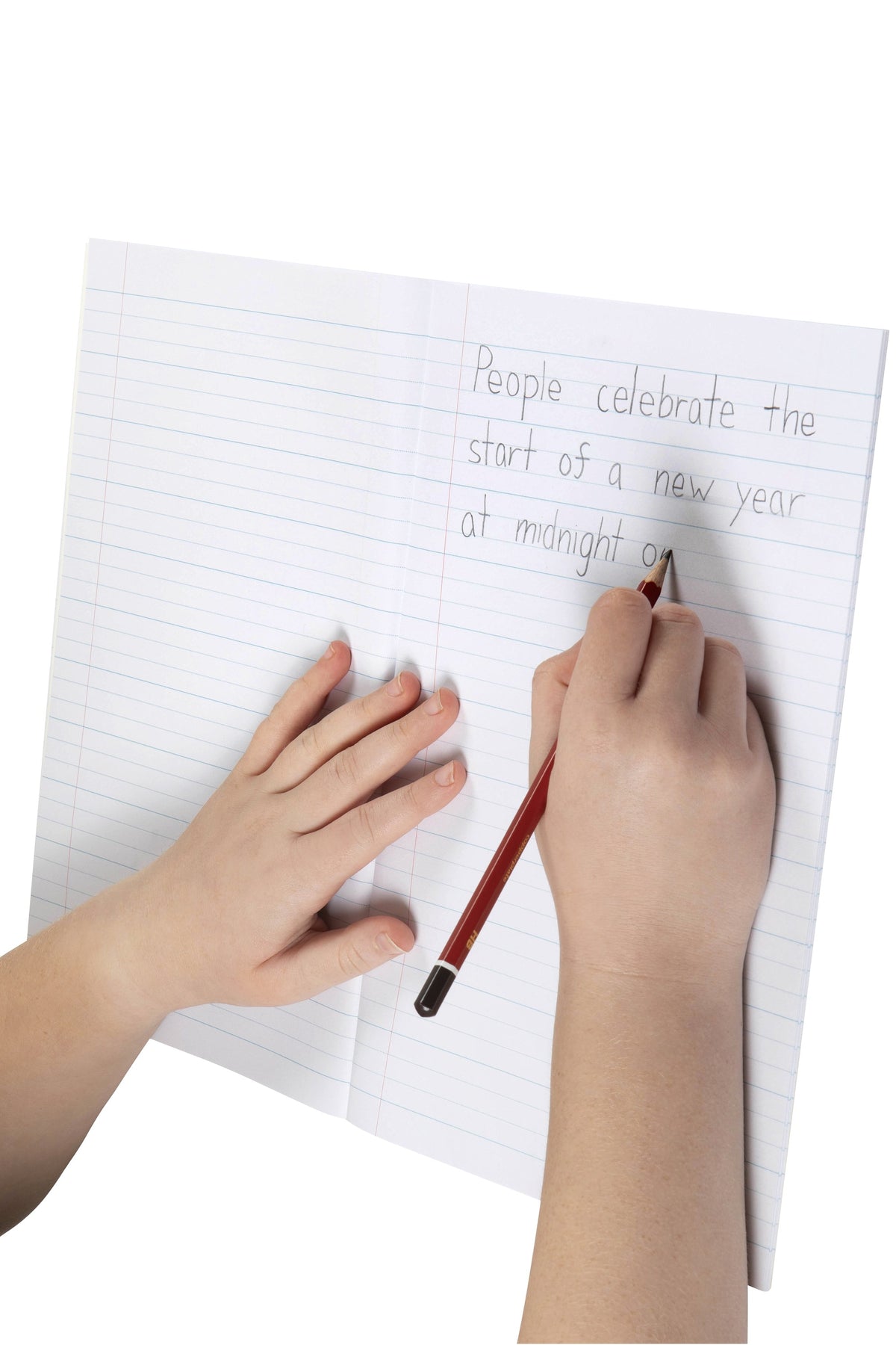 A young writer printing a sentence in pencil on the wide 24mm dotted thirds lines of an open Spirax 105 exercise book