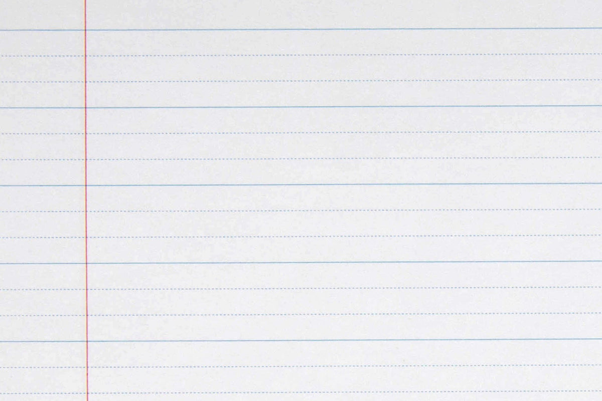 Close-up of the page ruling in the Spirax 117 exercise book: solid blue lines with two dotted guide lines splitting each space into thirds, and a red margin line