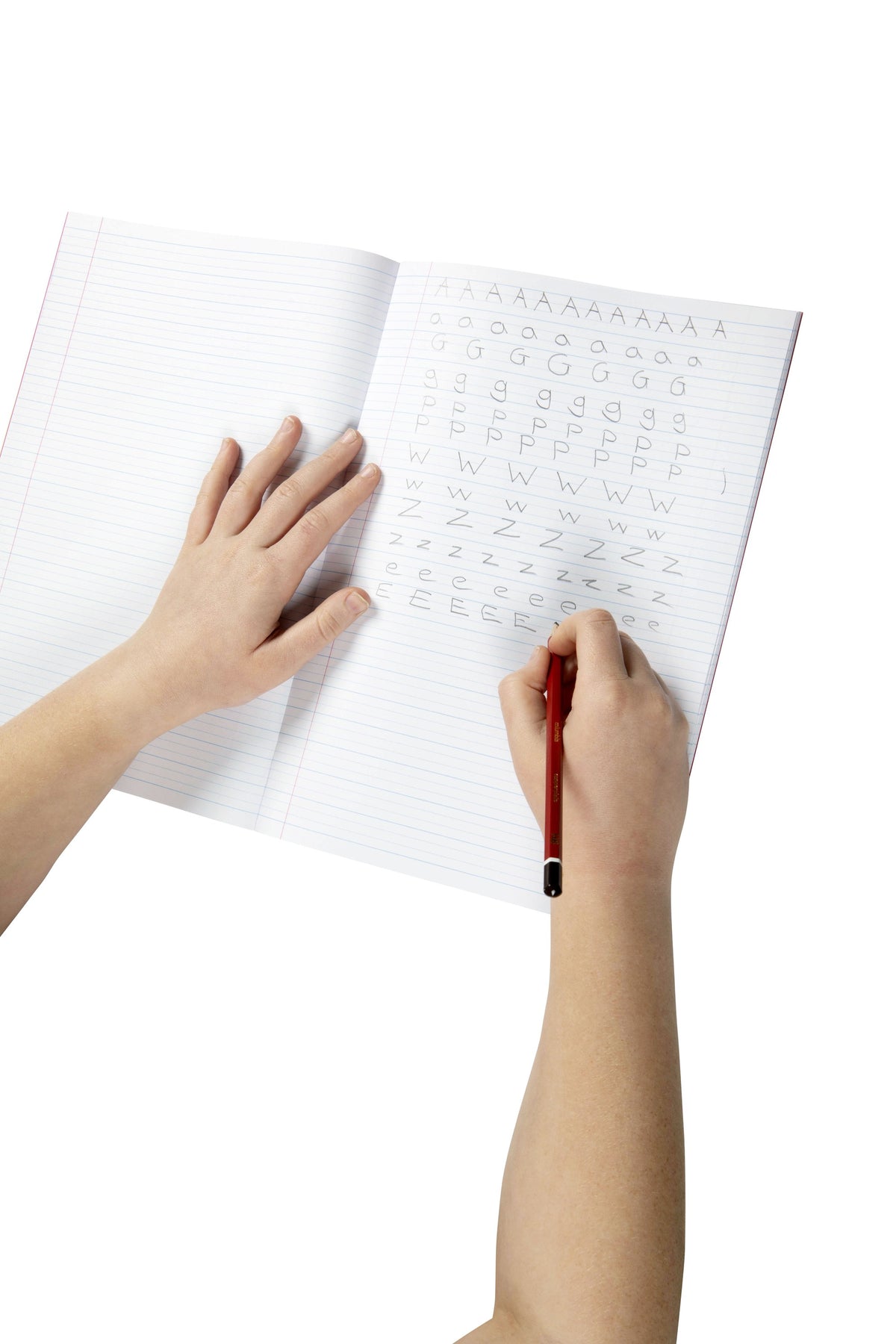 A child practising capital and lower case letters in pencil on the 14mm dotted thirds ruling of an open Spirax P103 exercise book