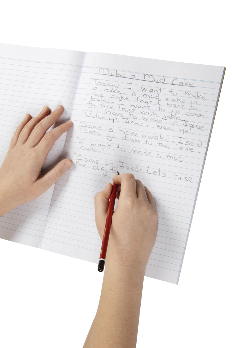 A child writing a story titled Make a Mud Cake in pencil on the 8mm ruled pages of an open Spirax P106 exercise book