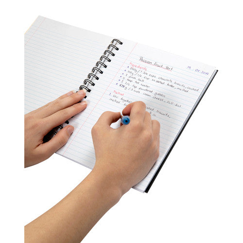 Hand writing a dated recipe list on the ruled pages of an open Spirax 511 notebook with a black cover