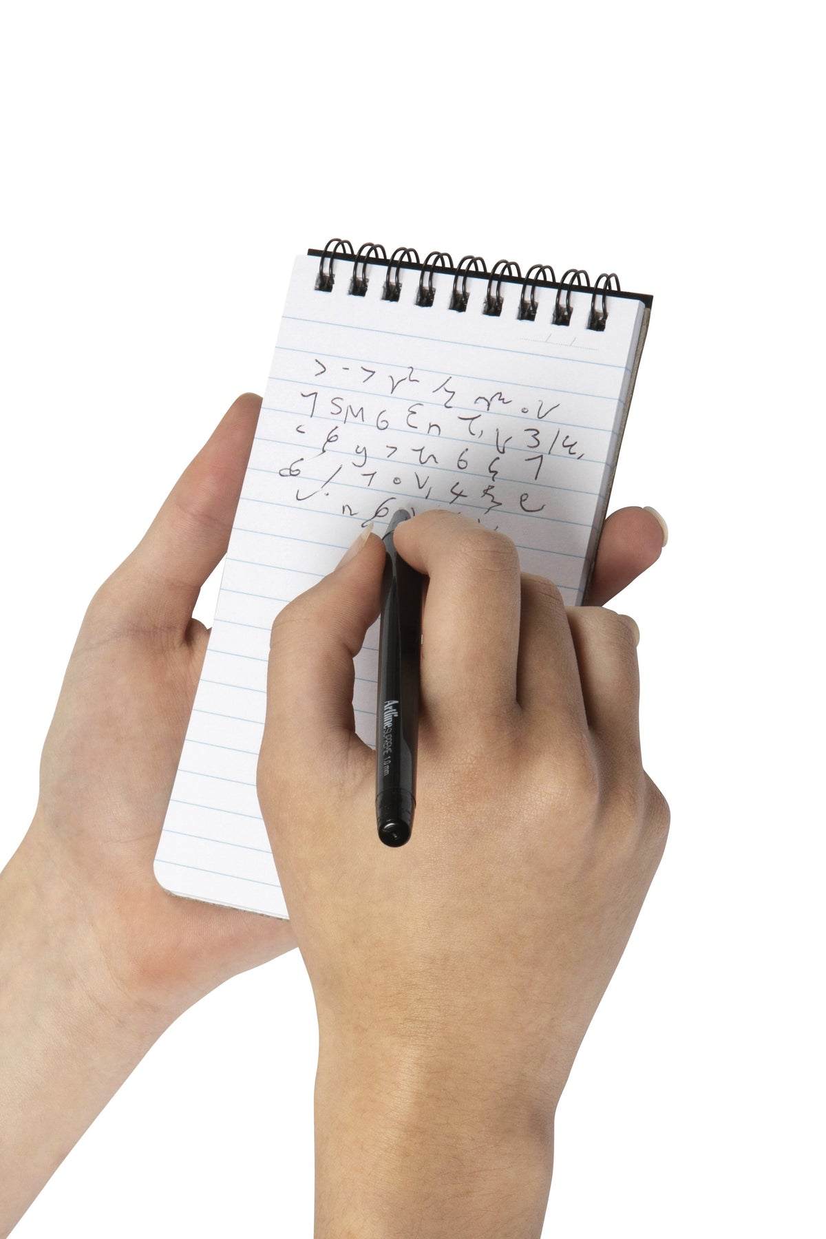 Spirax P541 note pad held in one hand while the other writes shorthand notes in pen on the ruled top opening page, black twin wire along the top edge