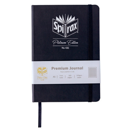 Jet black Spirax journal with its paper band reading Premium Journal, Faux Leather in Jet, A5, 7mm ruled, 160 pages, 100gsm paper