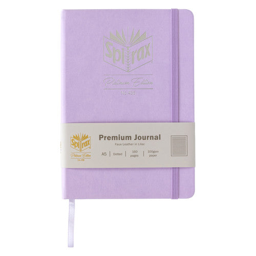 Lilac Spirax journal with its paper band showing Premium Journal, Faux Leather in Lilac, A5, Dotted, 160 pages and 100gsm paper