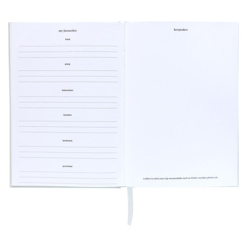 Spirax travel journal open at a my favourites page with food and drink lines opposite a blank keepsakes page