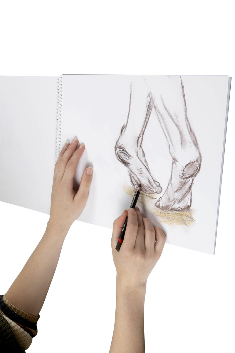 Hand drawing a pair of feet in pencil and pastel on a page of an open Spirax 579B sketch book folded back on its side spiral