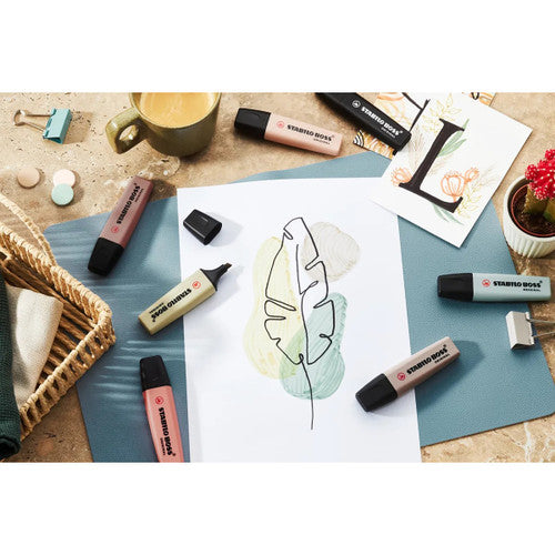 Stabilo Boss NatureColors Earth Green highlighter in hand highlighting document text