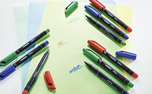 Stabilo OHPen Universal red pen writing on a smooth transparent surface