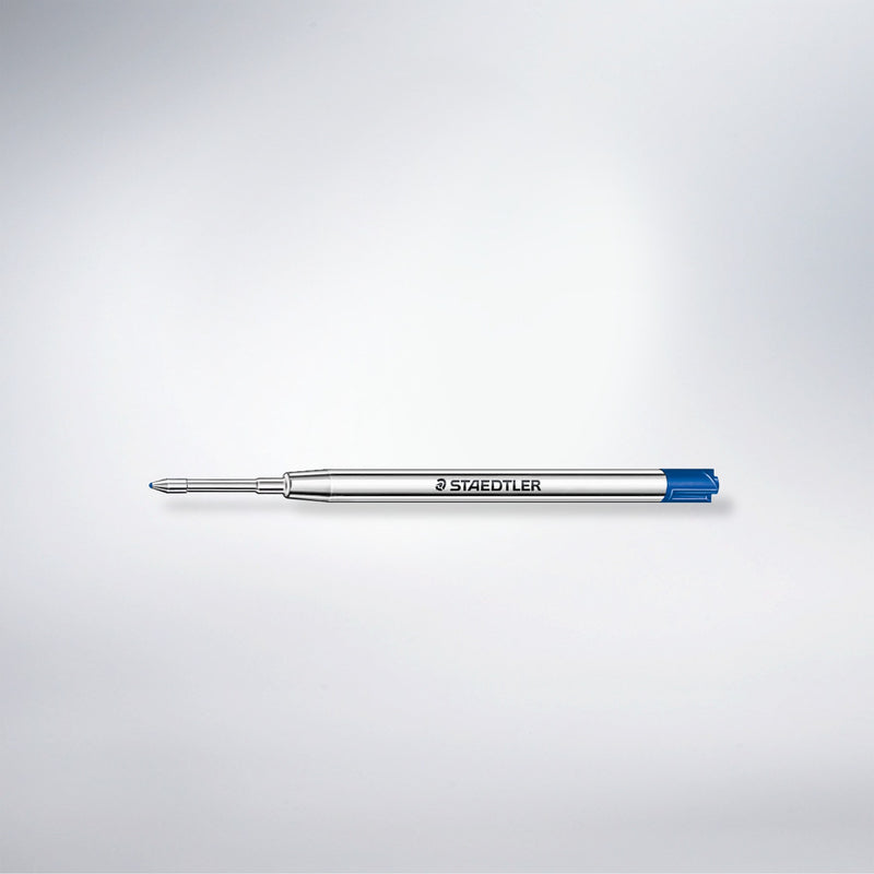 Staedtler 458 M-3 blue ballpoint refill photographed alone on a pale grey gradient background