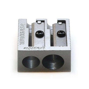 Staedtler 510 20 silver metal double-hole sharpener at an angle, a large and a small hole side by side with ridged sides