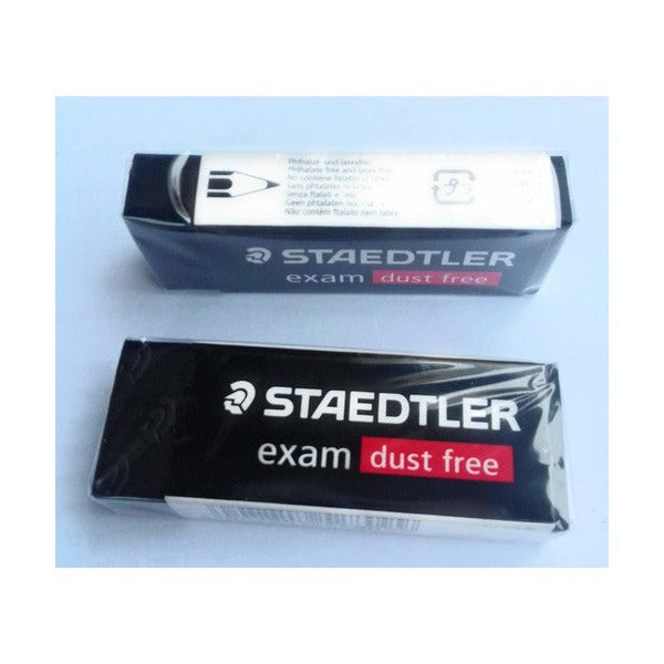 Two wrapped Staedtler exam black erasers, one turned to show the sleeve printed STAEDTLER exam dust free