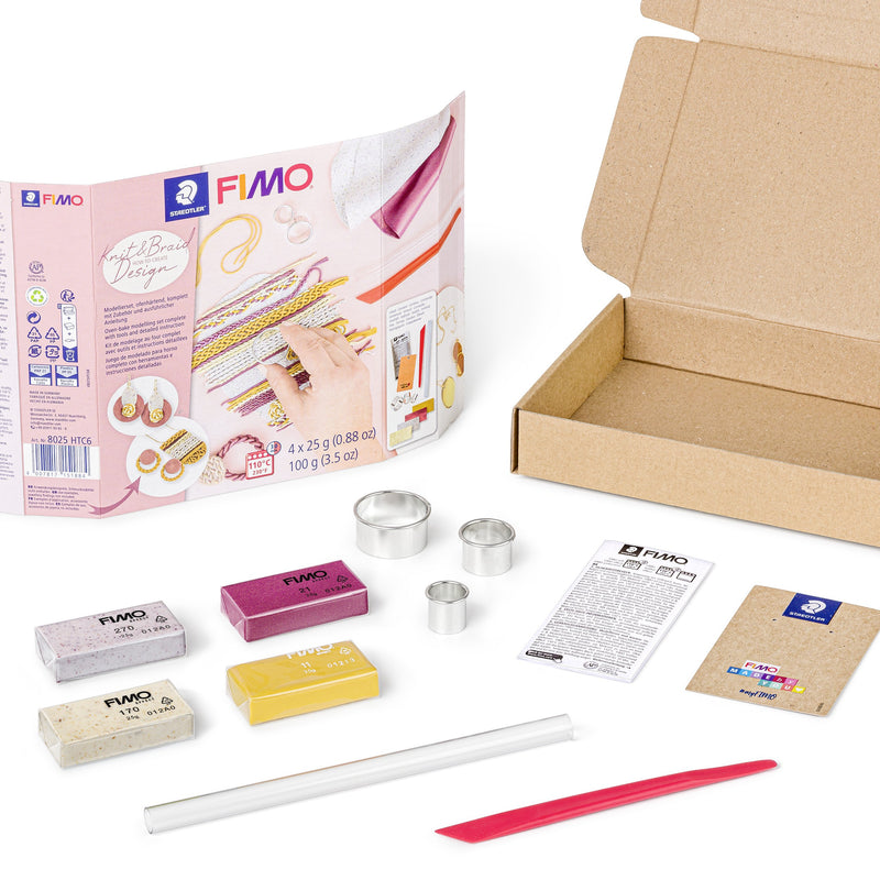 Contents of the FIMO knit and braid set: four clay half blocks, three round metal cutters, roller, modelling stick and leaflet