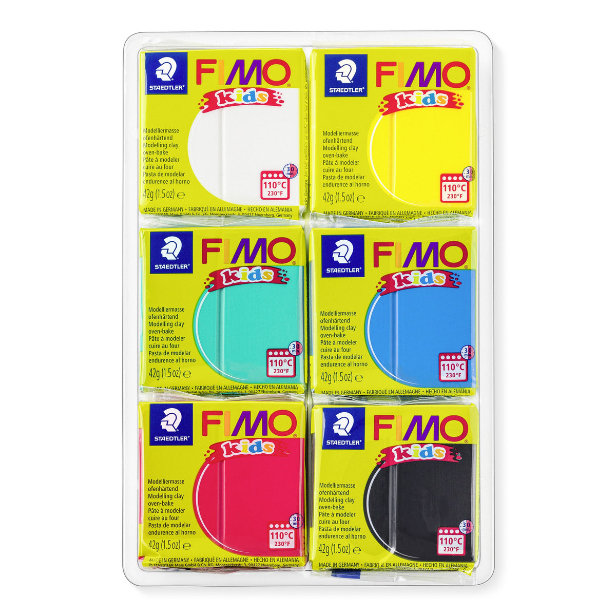 Six wrapped FIMO kids blocks in a clear tray: white, yellow, turquoise green, blue, red and black