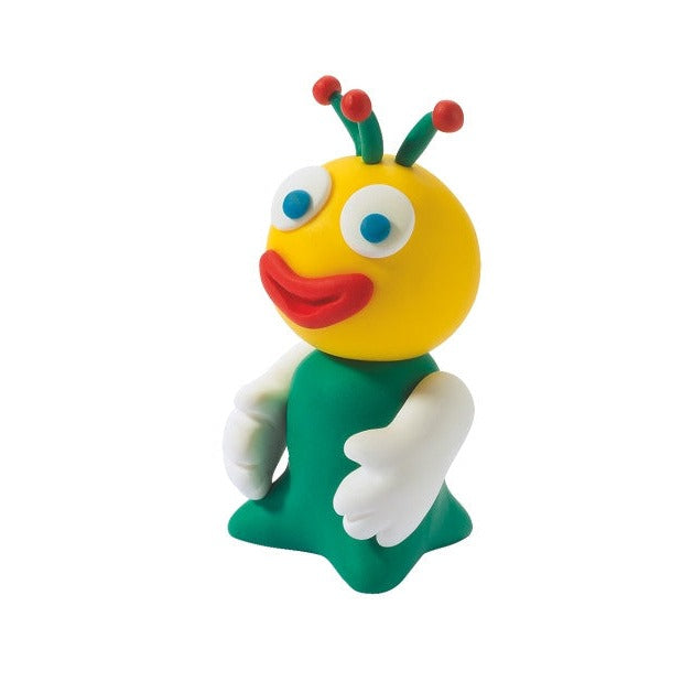 Finished FIMO kids figure in yellow and green with big eyes, red lips and antennae