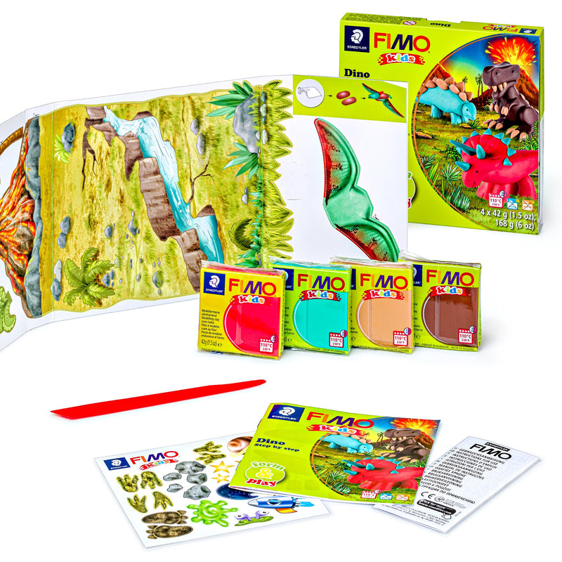 Dino set contents: prehistoric fold-out backdrop, four clay blocks, red stick, instruction booklet and stickers