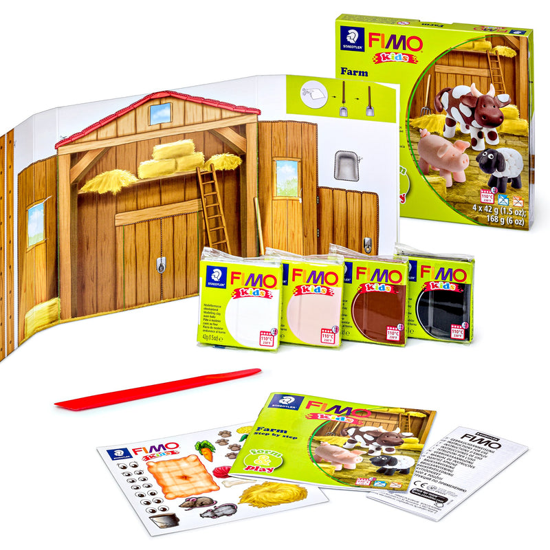 Farm set contents: fold-out barn backdrop, four clay blocks, red modelling stick, instruction booklet and sticker sheet