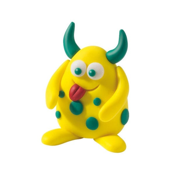 Yellow clay monster with green horns, green spots and a red tongue