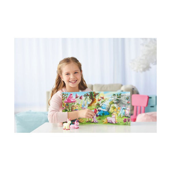 Smiling girl sitting behind a unicorn meadow scene made with FIMO kids clay