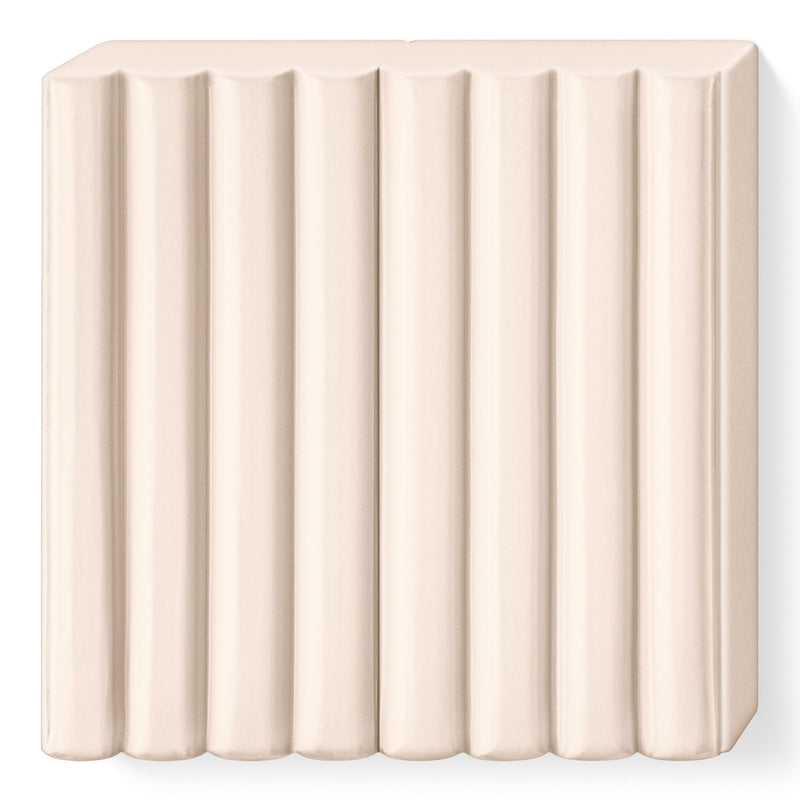 Unwrapped pale pink FIMO kids block 8030-43 in a very light pink with its 8 segments