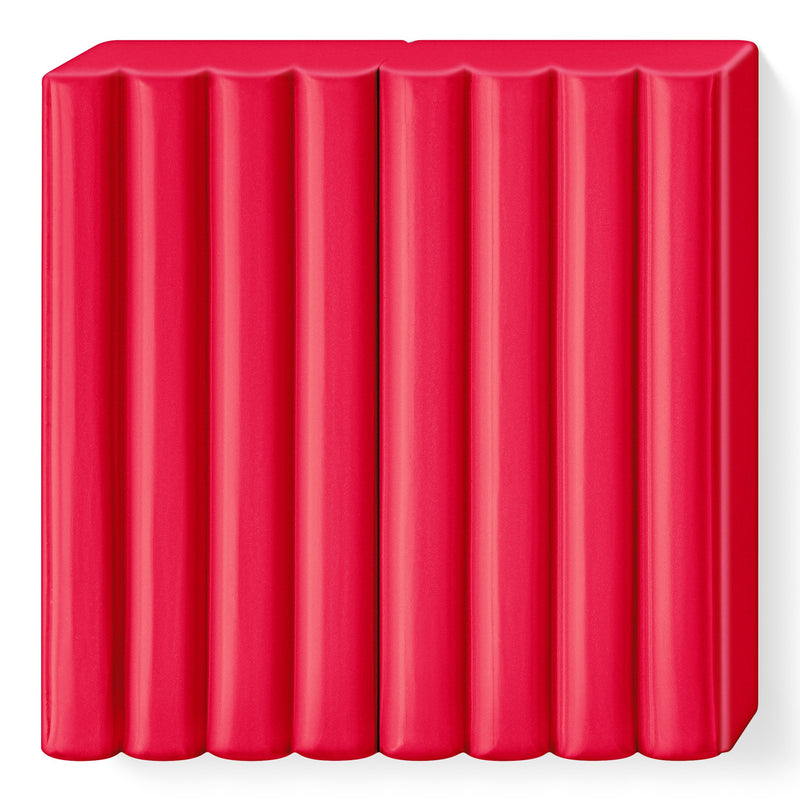 Unwrapped red FIMO kids block showing the ribbed top that divides it into 8 portions