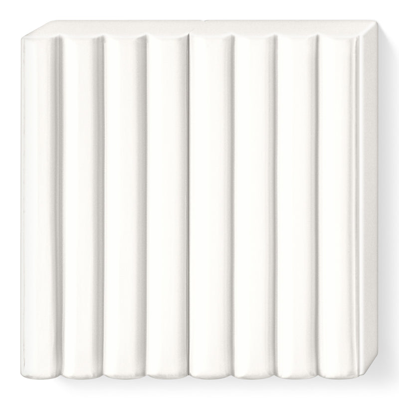 Unwrapped white FIMO kids block showing the ribbed top that divides it into 8 portions
