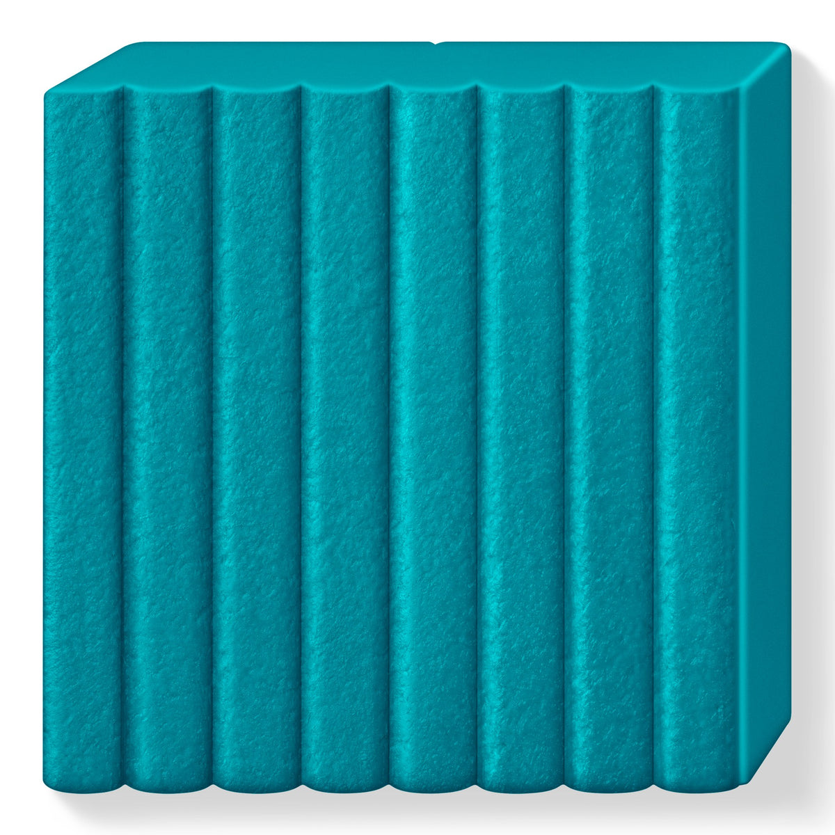 Unwrapped lagoon FIMO leather-effect block showing a fine leather-grain surface across its 8 ribbed sections