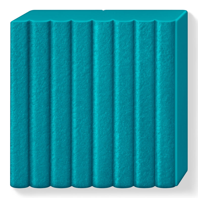 Unwrapped lagoon FIMO leather-effect block showing a fine leather-grain surface across its 8 ribbed sections
