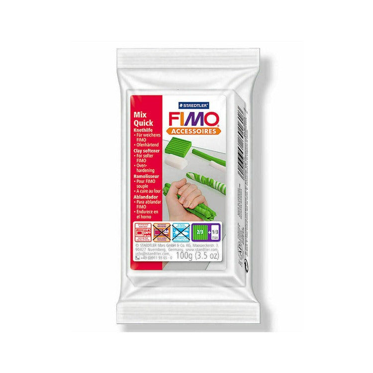 Earlier FIMO Mix Quick 100 g pack design with a red side panel and hands kneading green and white clay, shown as previous packaging
