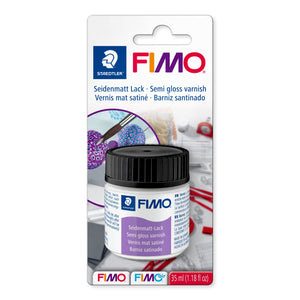 FIMO 8705 01 BK semi-gloss varnish blister card with a white 35 ml jar, purple label reading Seidenmatt-Lack and semi gloss varnish, FIMO and FIMOair logos at the base