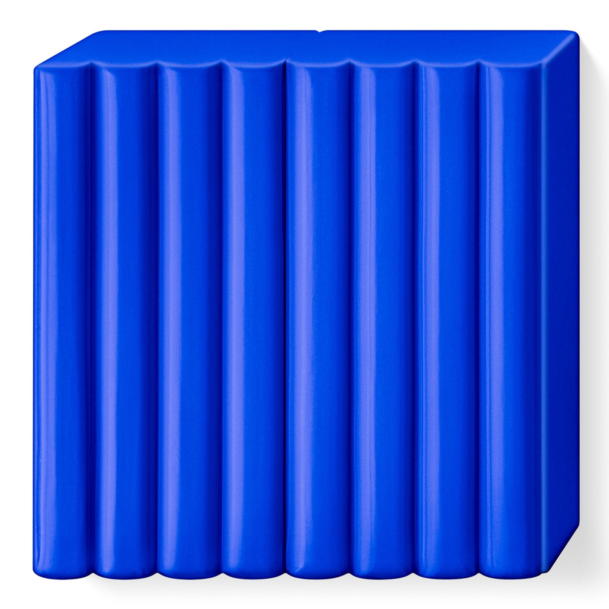 Unwrapped FIMO soft brilliant blue block scored into 8 equal portions, showing the strong mid blue clay colour