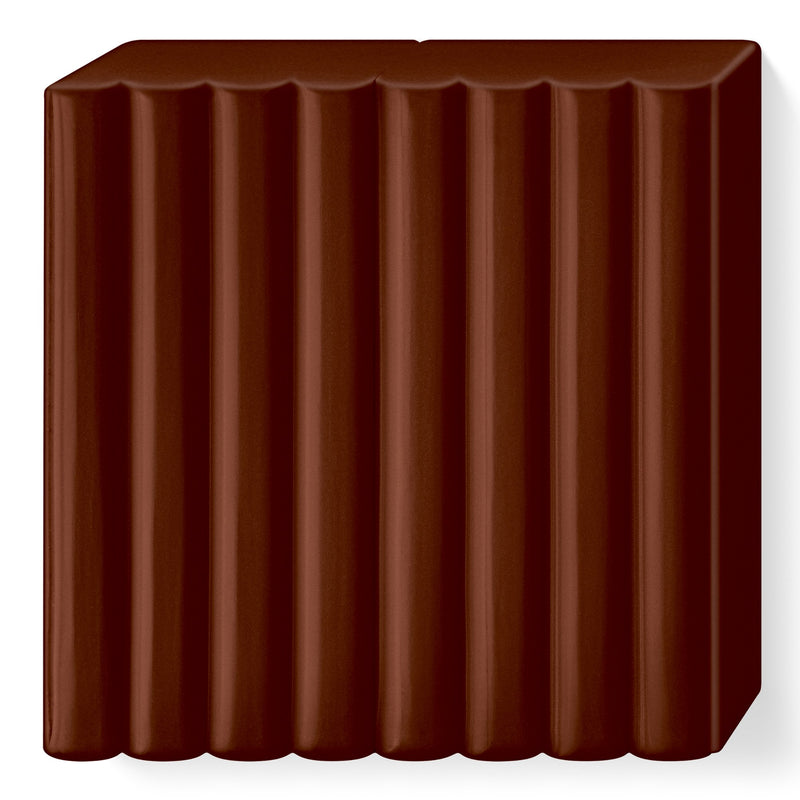 Unwrapped dark chocolate brown FIMO soft block, scored lines dividing it into 8 portions