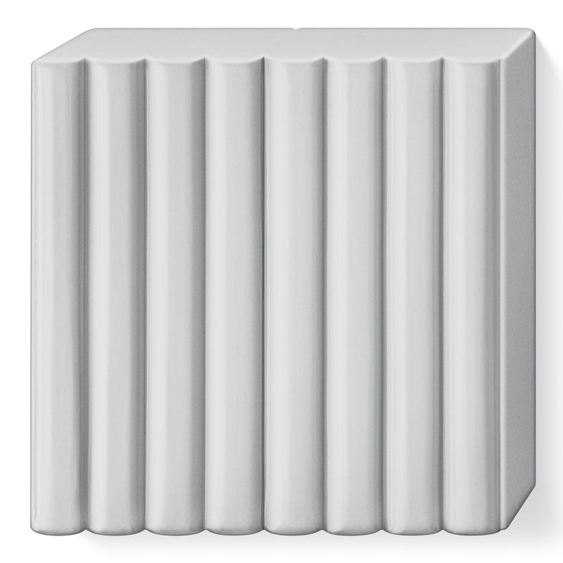 Unwrapped dolphin grey FIMO soft block with 8 scored portions, a cool light to mid grey