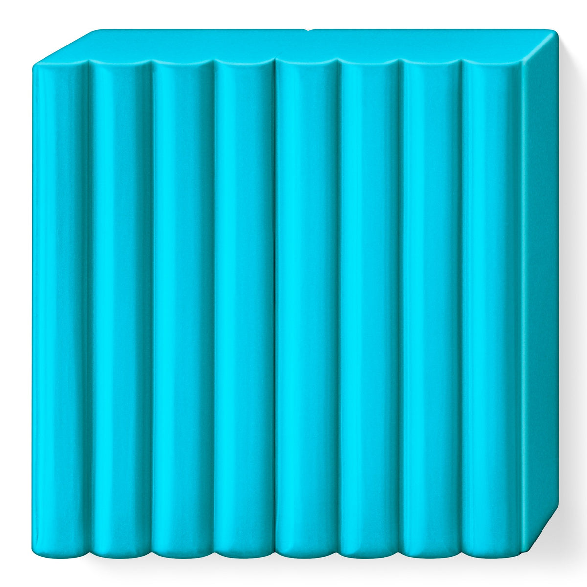FIMO soft peppermint out of its wrapper, a light turquoise block divided into 8 portions