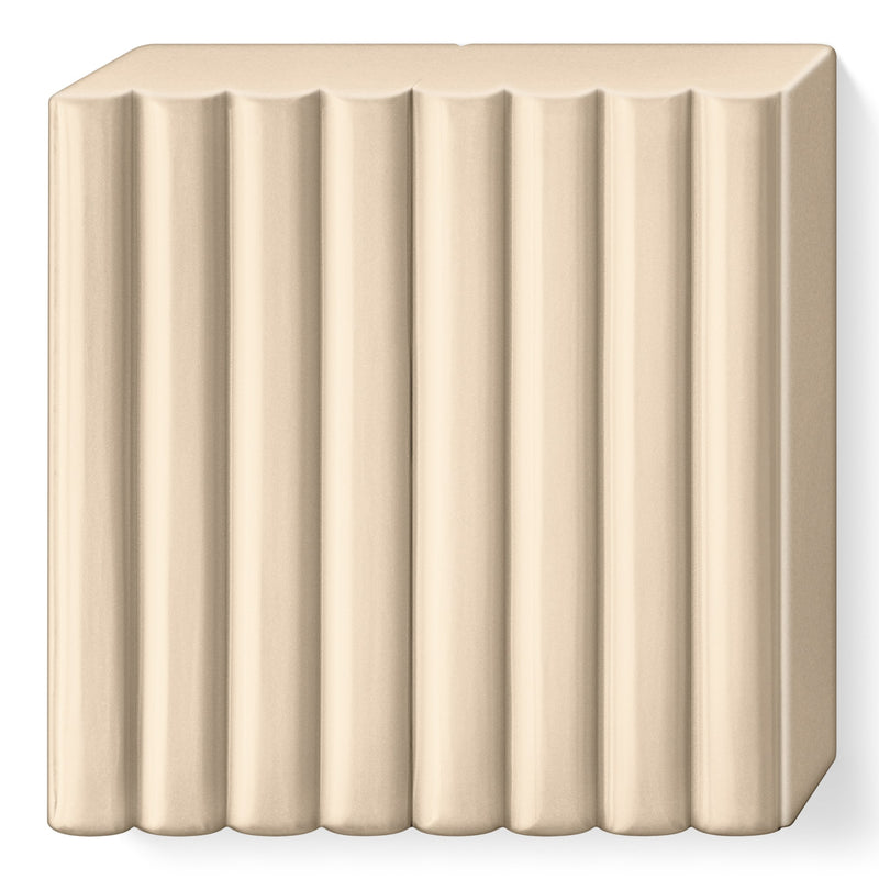 Sahara FIMO soft block with wrapper removed, a pale sand beige slab with 8 scored portions