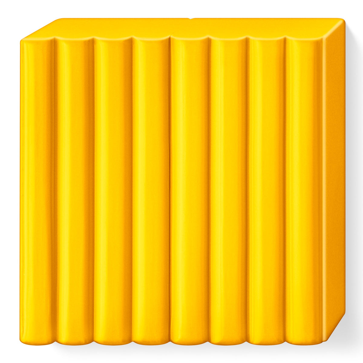 FIMO soft sunflower block unwrapped, golden yellow clay scored into 8 portions