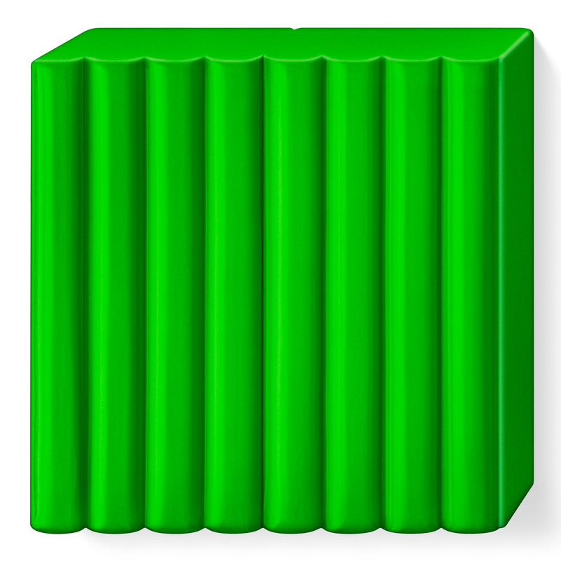 Unwrapped FIMO soft tropical green block, bright fresh green clay with 8 scored portions
