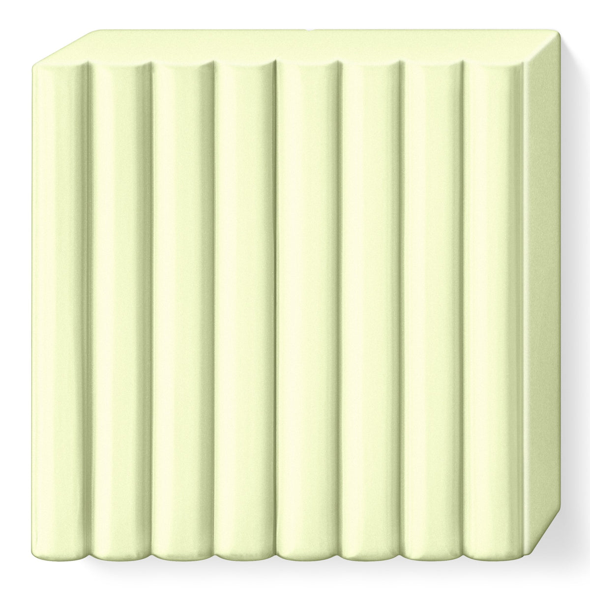Vanilla FIMO soft block out of the pack, a pale cream yellow slab with portion grooves