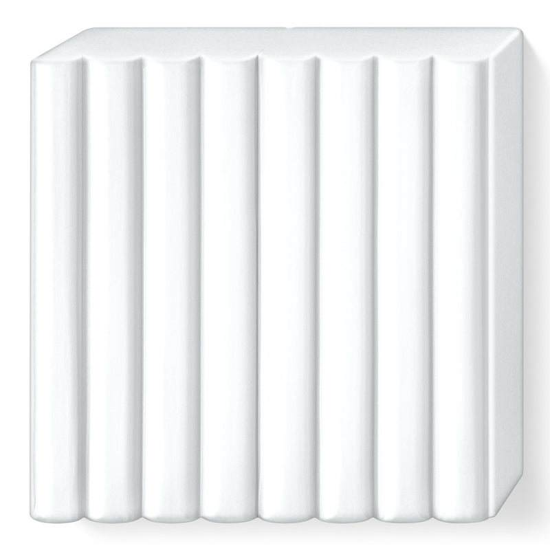 Unwrapped white FIMO soft block scored into 8 equal portions