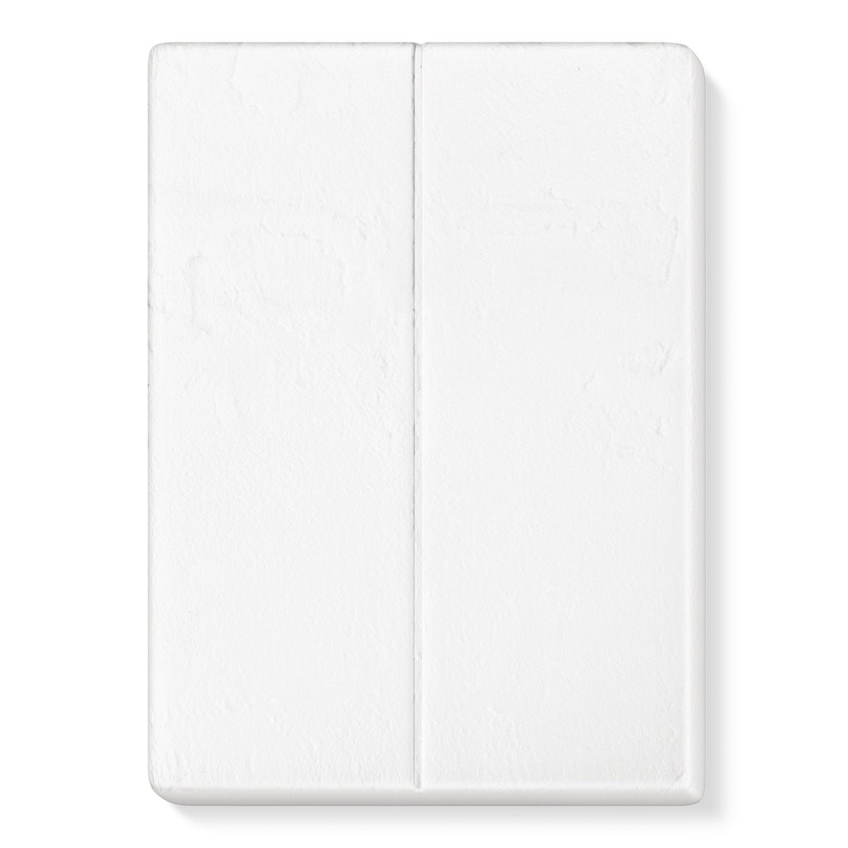 Unwrapped white FIMOair light block scored into two halves, shown straight out of the foil