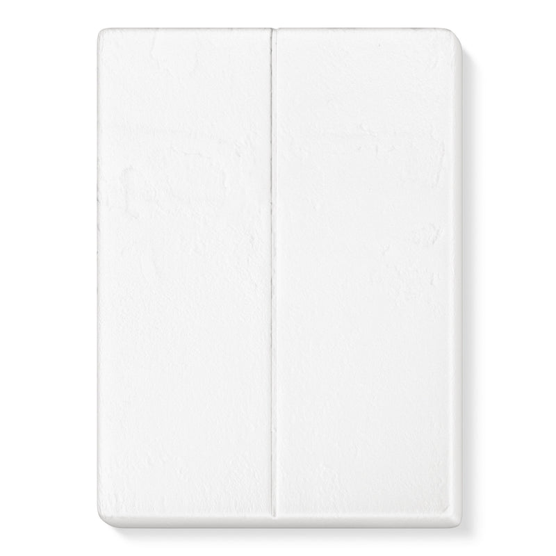 Unwrapped white FIMOair light block scored into two halves, shown straight out of the foil