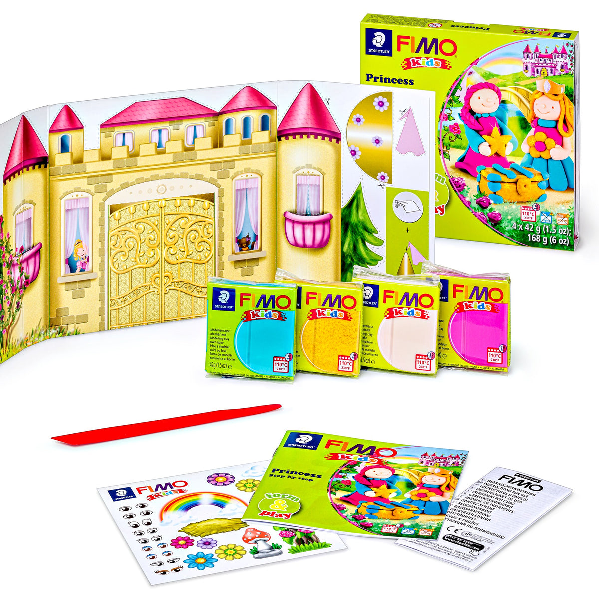 Contents of the FIMO kids Princess set: four clay blocks, a fold-out golden castle gate scene, a red modelling stick, a booklet and sticker sheet