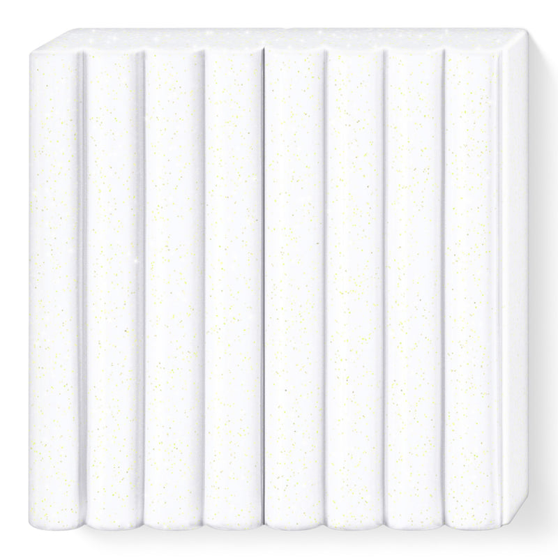 Unwrapped glitter white FIMO kids block in 8 ribbed portions with fine glitter visible through the white clay