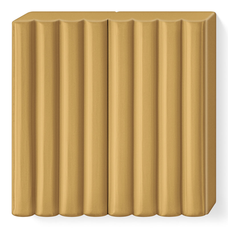 Unwrapped light brown FIMO kids block with 8 ribbed segments in a caramel tone
